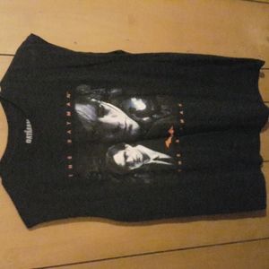 The Batman t-shirt with the sleeves cut out of it